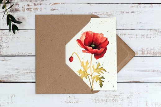 Poppy flower on plantable poppy seed paper with digital printing and kraft envelope.