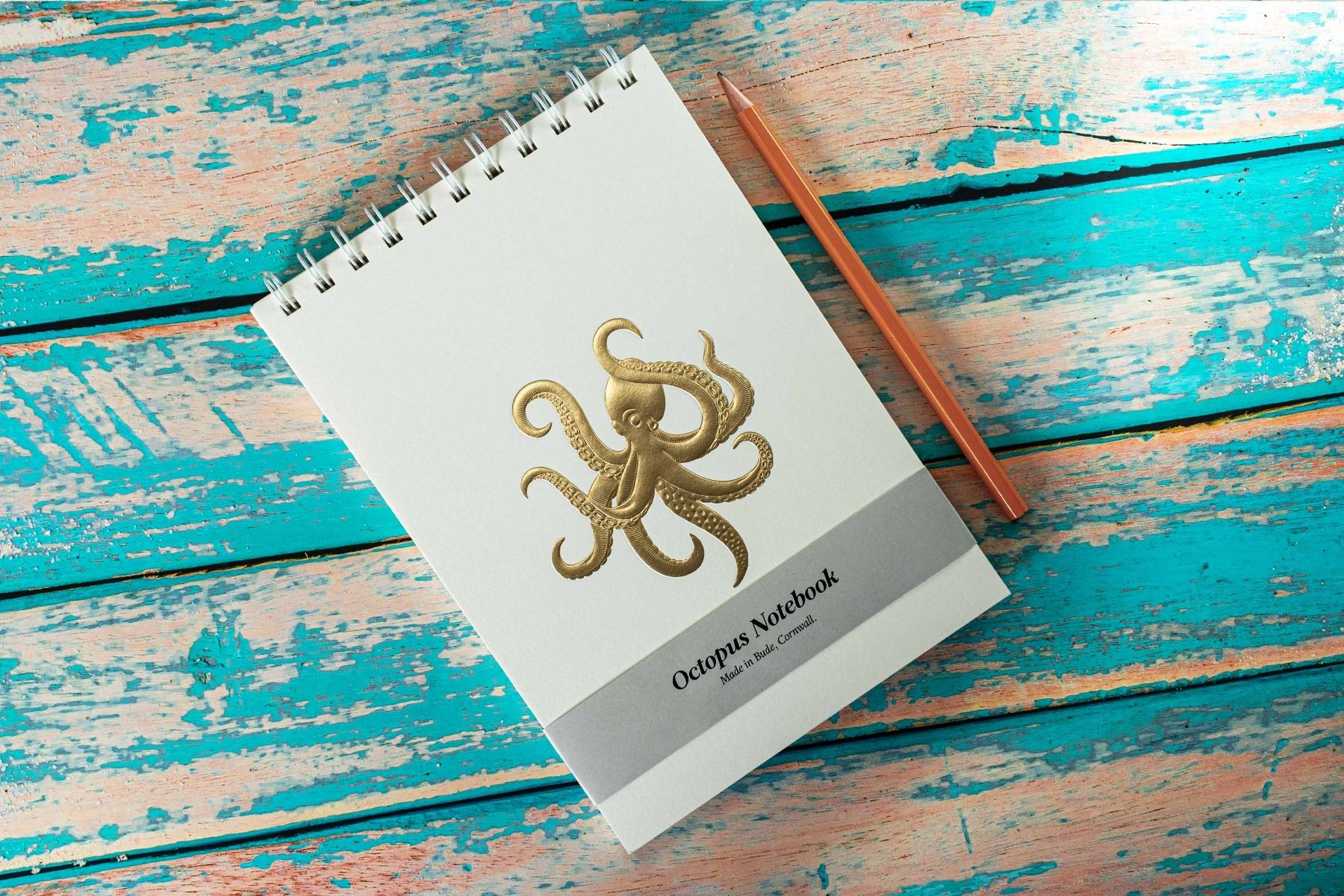 Gold foil embossed octopus notebook on Natural.